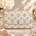 Louis Vuitton Mahina Iris Portefeuille Perforated Leather Ivory Continental Wallet
