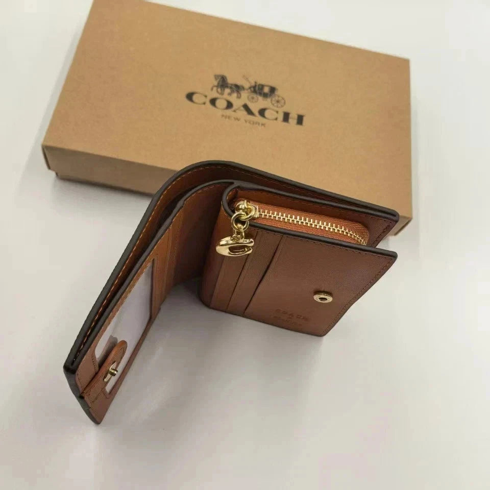 Coach X Peanuts Snap Wallet In Signature Canvas With Snoopy Print CBN32